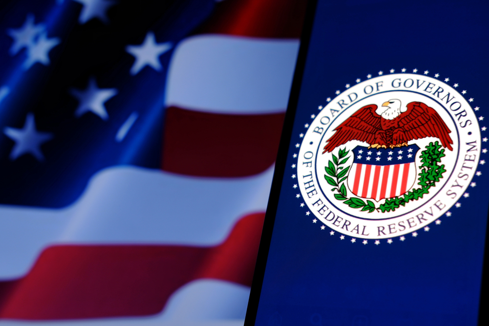 US flag and Federal Reserve logo