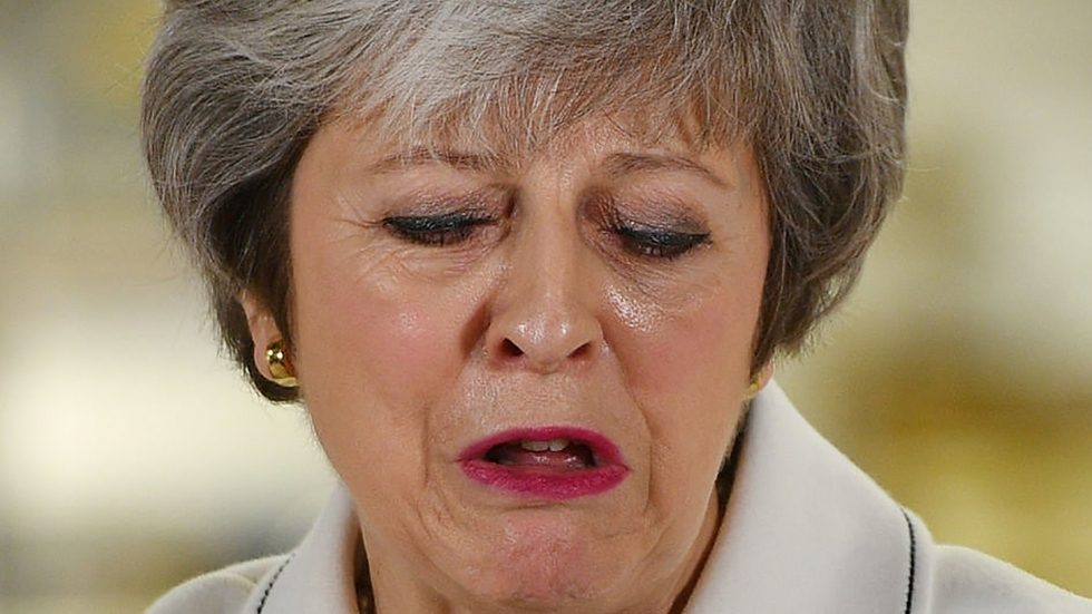 Theresa May defeated