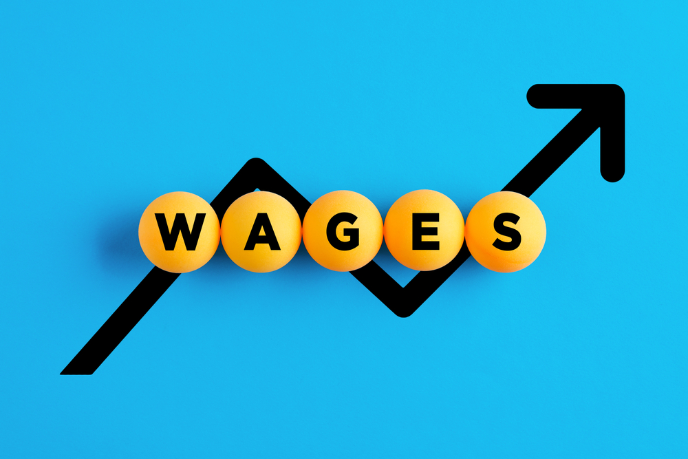Wage rises beat inflation, but decline from last month